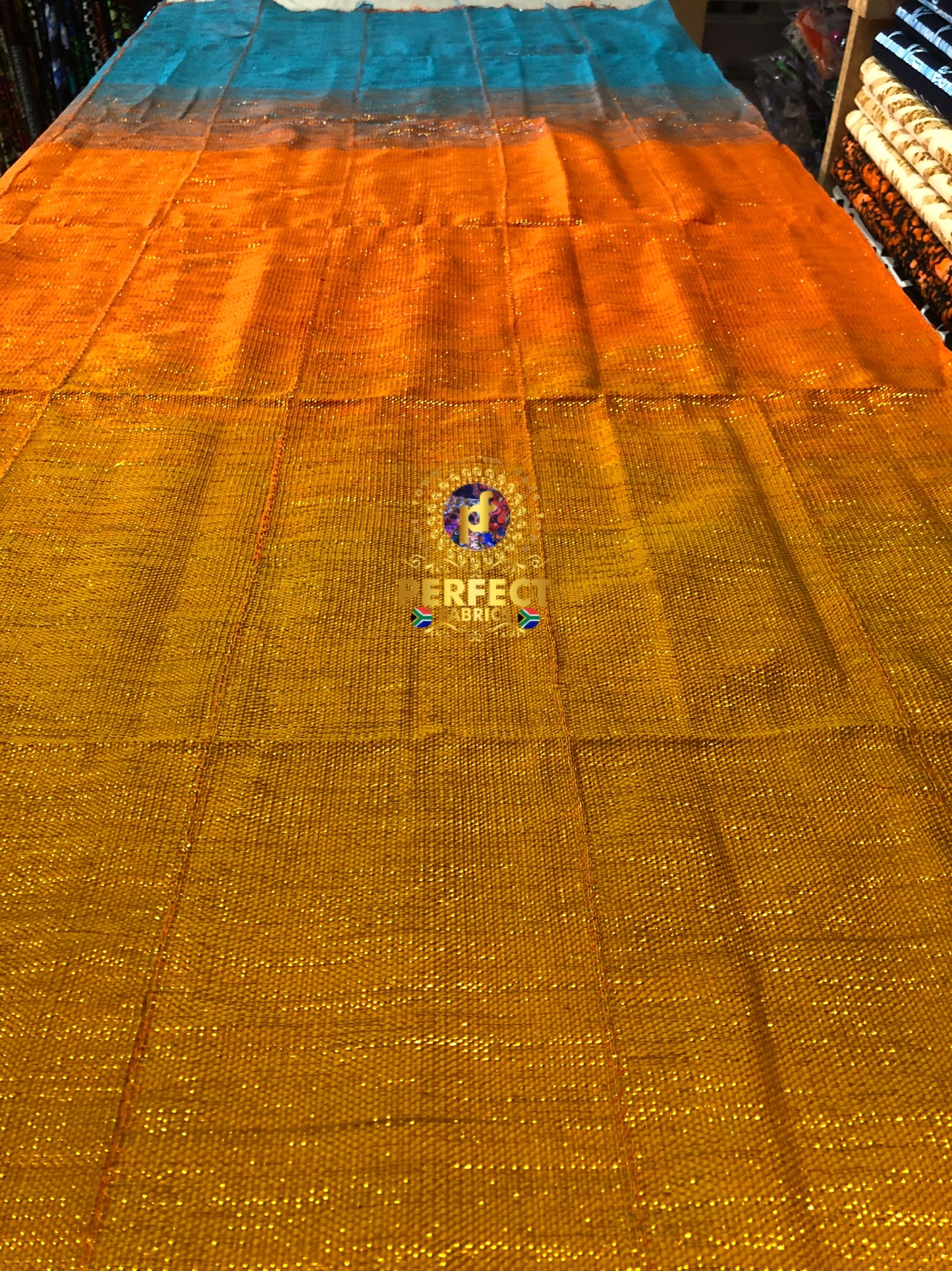 Blue,Orange & Gold Ombre Shimmery Plain Kente